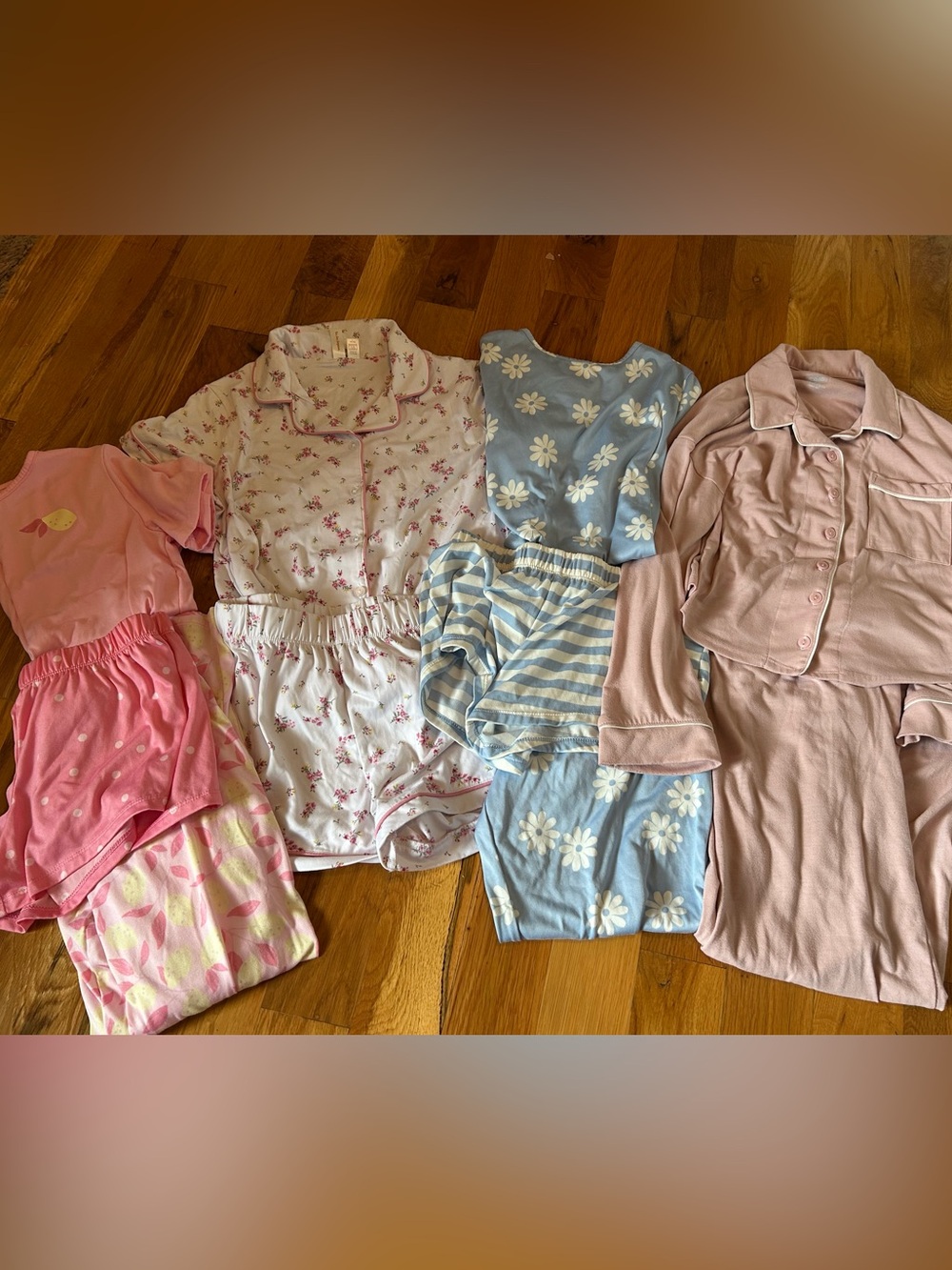 Girls 10/12 pajama sets. Two interchangeable pants/shorts sets. Pink is Gap Kids